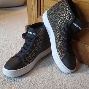 Never worn!Heelys Black and Gold Heart Sneakers sz 9